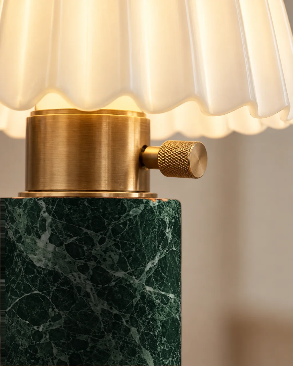 Brass rotary dimmer dial on the Pine lamp