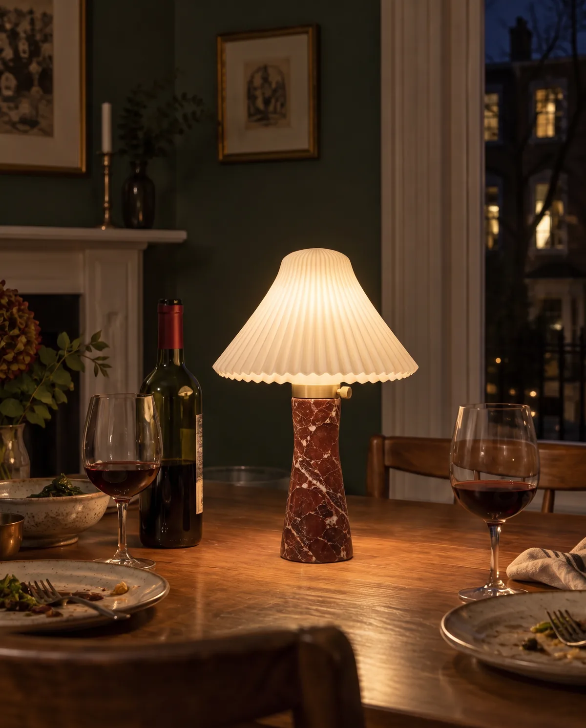 SHAN lamp in Ember on a dining table at night
